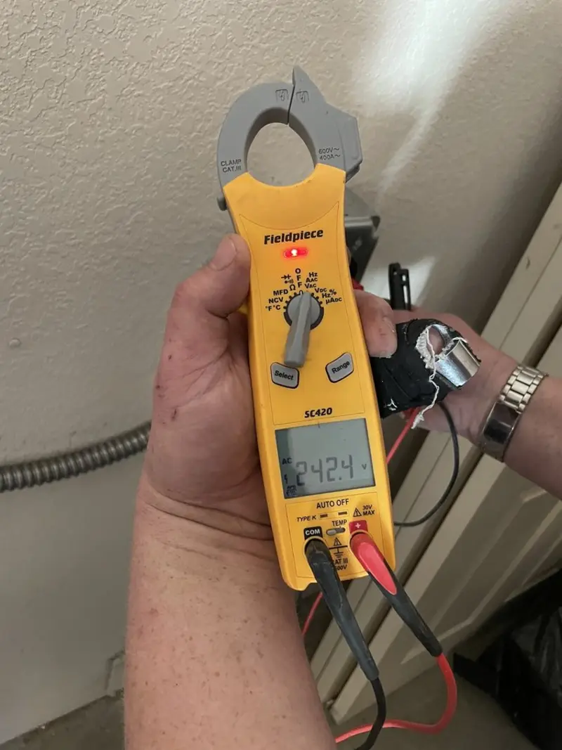 Voltage testing with clamp meter during Generator Installation in North Auburn